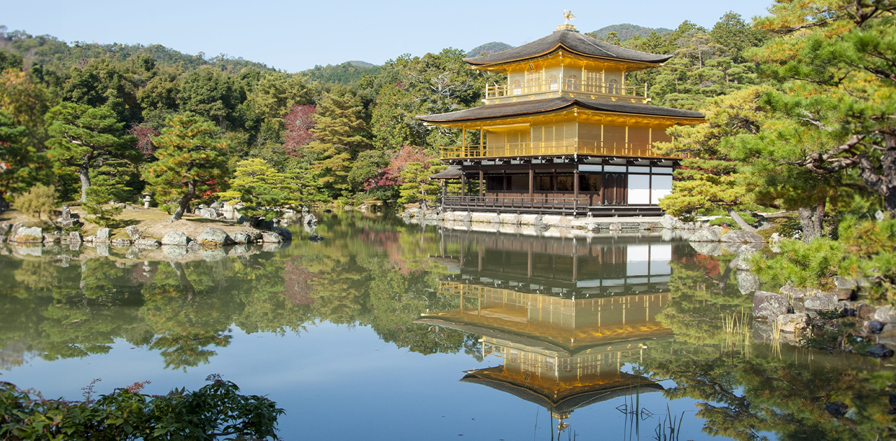 Photo of the Golden Pavilion and its reflection in a surrounding lake